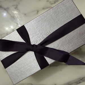 Elegant Silver Gift Box with Black Ribbon